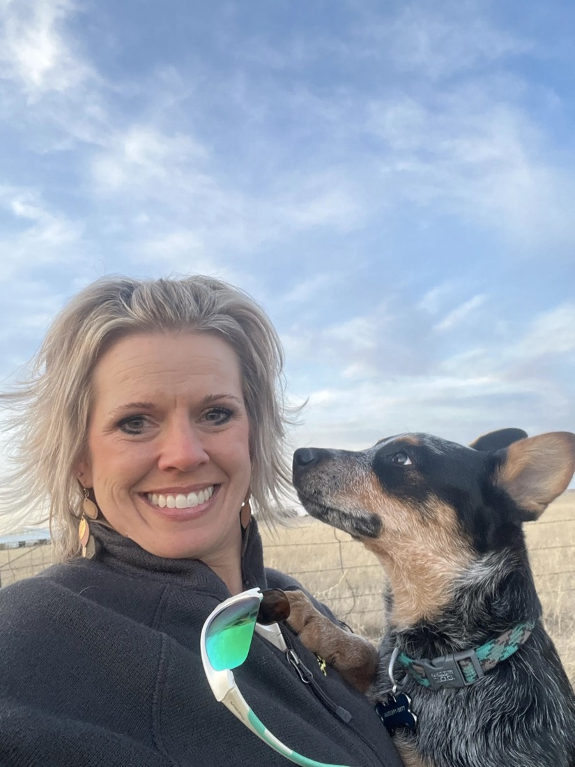 Amy Painter with her dog outdoors